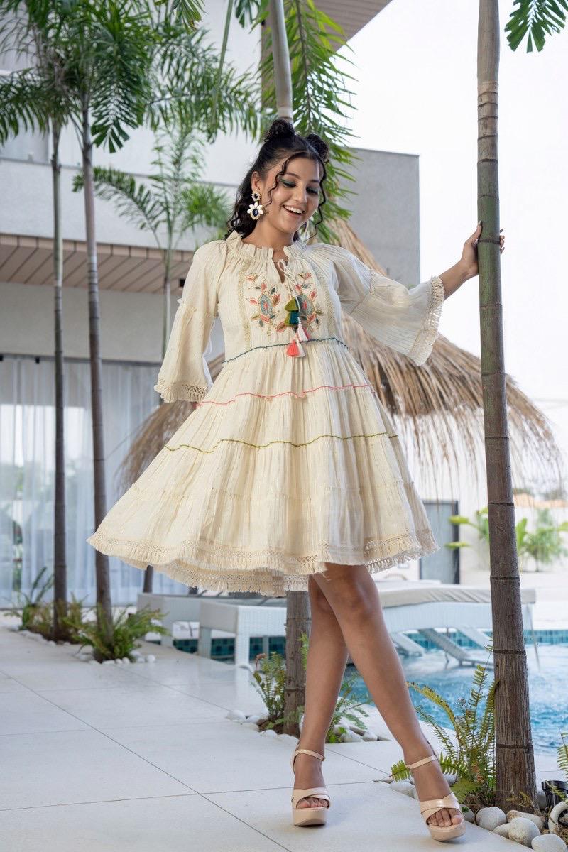 Tassel Whimsy: Cream Tiered Boho Dress with Floral Embroidery